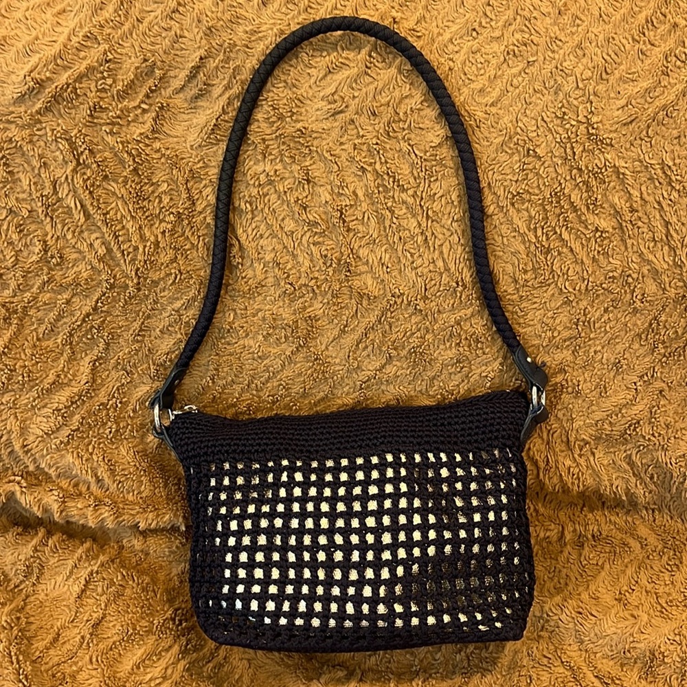 The Sak navy crochet w/ silver lining small shoulder bag